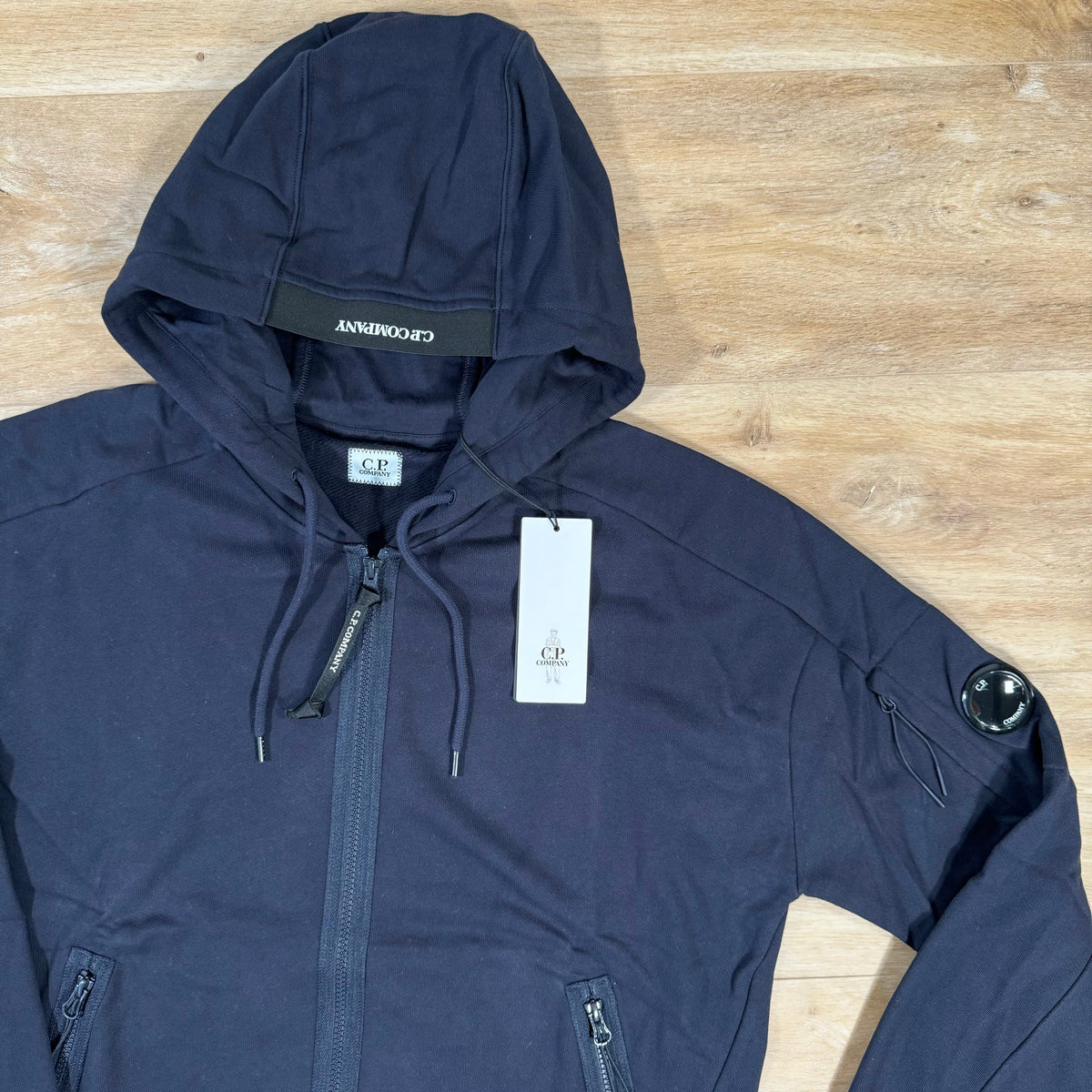 C.P. Company Diagonal Raised Zipped Lens Hoodie in Navy