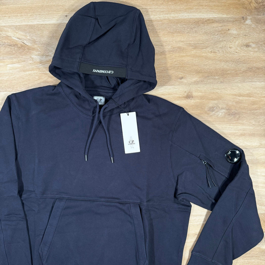 C.P. Company Diagonal Raised Fleece Lens Hoodie in Navy