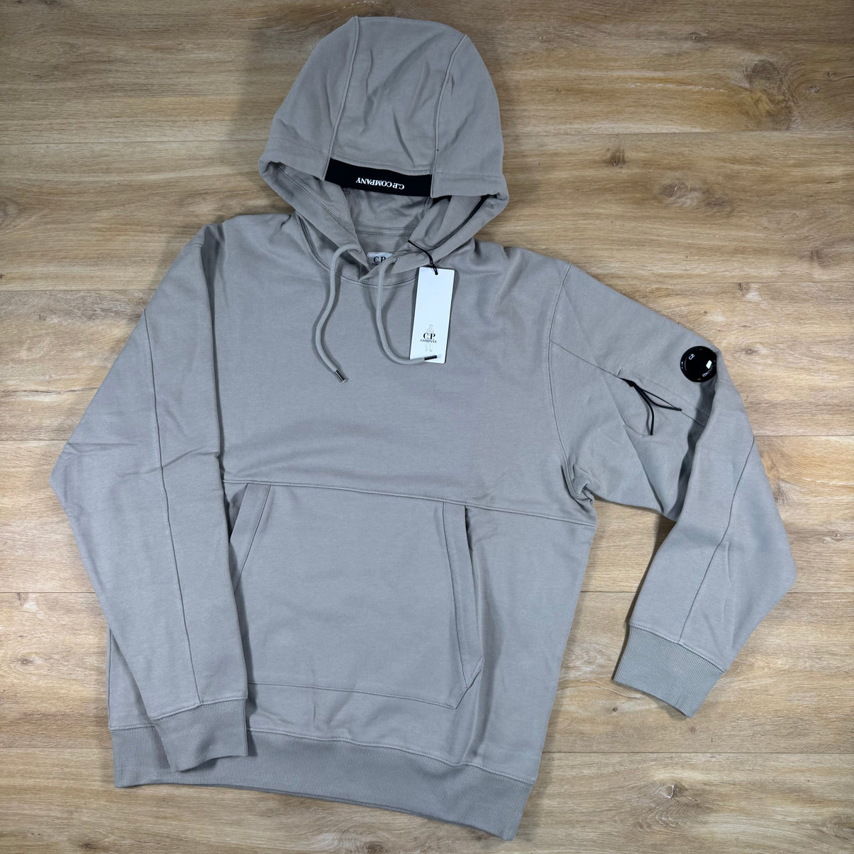 C.P. Company Diagonal Raised Fleece Lens Hoodie in Dove